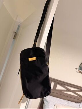 Tumi Black Crossbody Sling with Gold Hardware